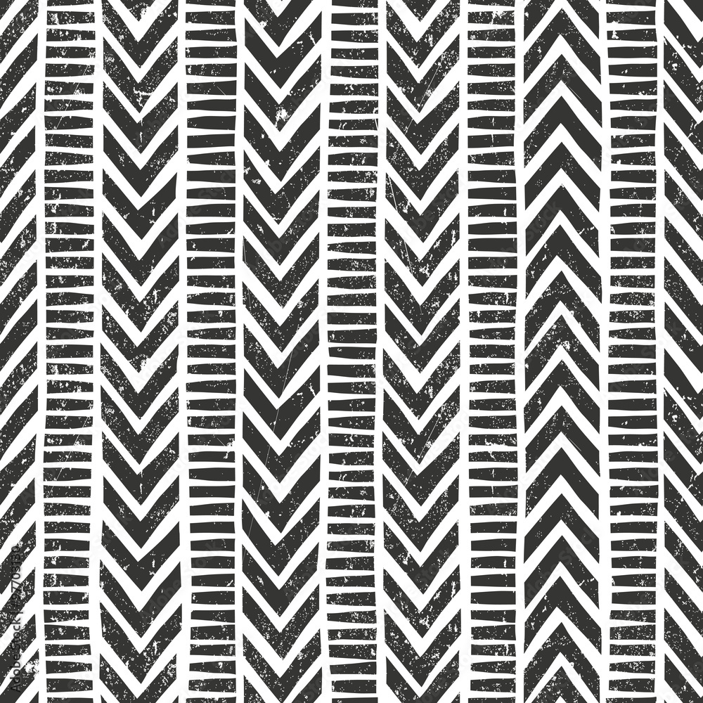 © evdakovka - Vector hand drawn tribal pattern. Seamless geometric background with grunge texture. © evdakovka - Vector hand drawn tribal pattern. Seamless geometric background with grunge texture.
