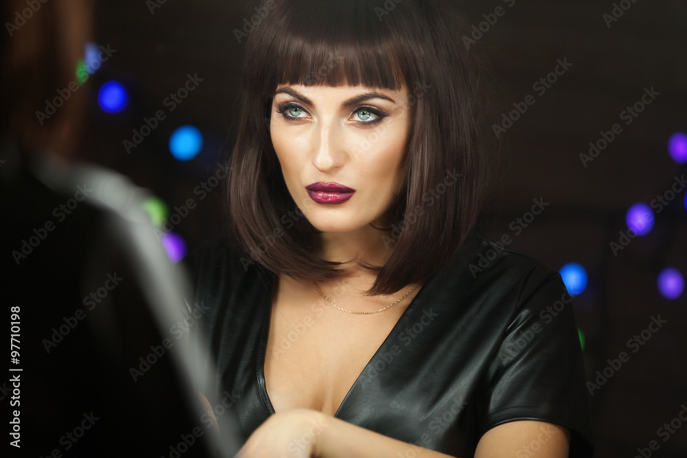 Portrait of a style brunette woman