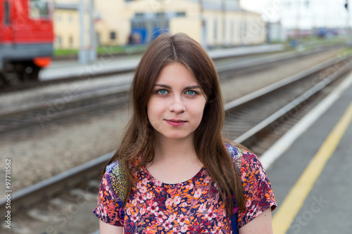 Young girl on train station platform with bags © ArtEvent ET