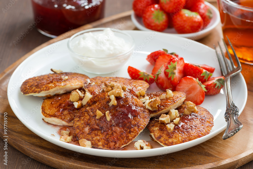 Pancakes with fresh strawberries and cream, jam Pancakes with fresh strawberries and cream, jam