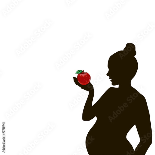 silhouette of a pregnant woman with a red apple in the palm of y