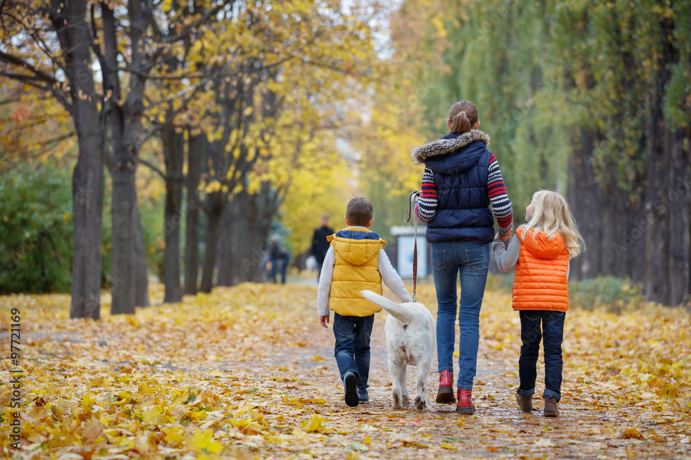 Kids with his dog labrador