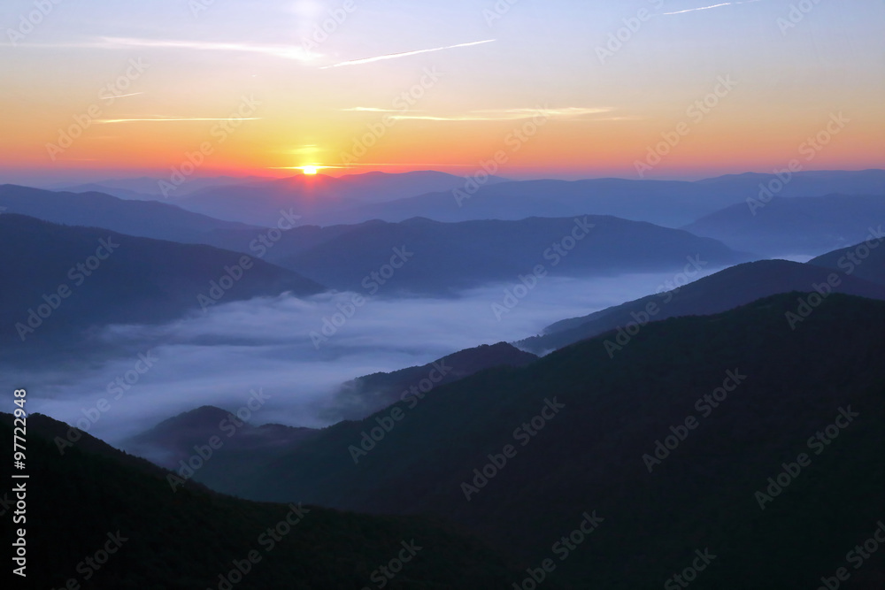 mountains in the mist before sun dawn