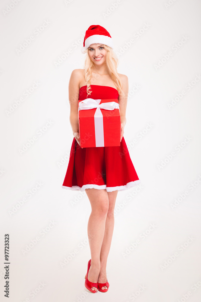 Seductive young woman in red santa claus dress and hat Seductive young woman in red santa claus dress and hat