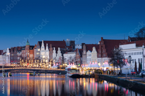 Lübeck, Christmas mood on the obertrave with historic facades. photo