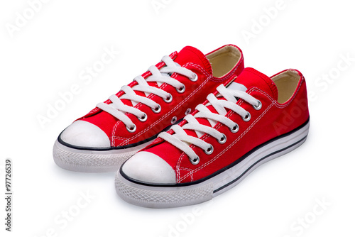 A pair of red gumshoes with shoelace