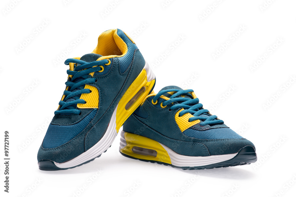 A pair of blue sports shoes with shoelace A pair of blue sports shoes with shoelace