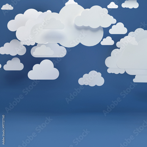 Abstract background composed of white paper clouds over blue.