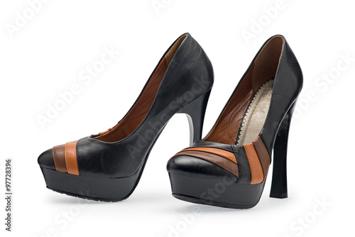 A pair of women's shoes black stilettos with a decorative belt