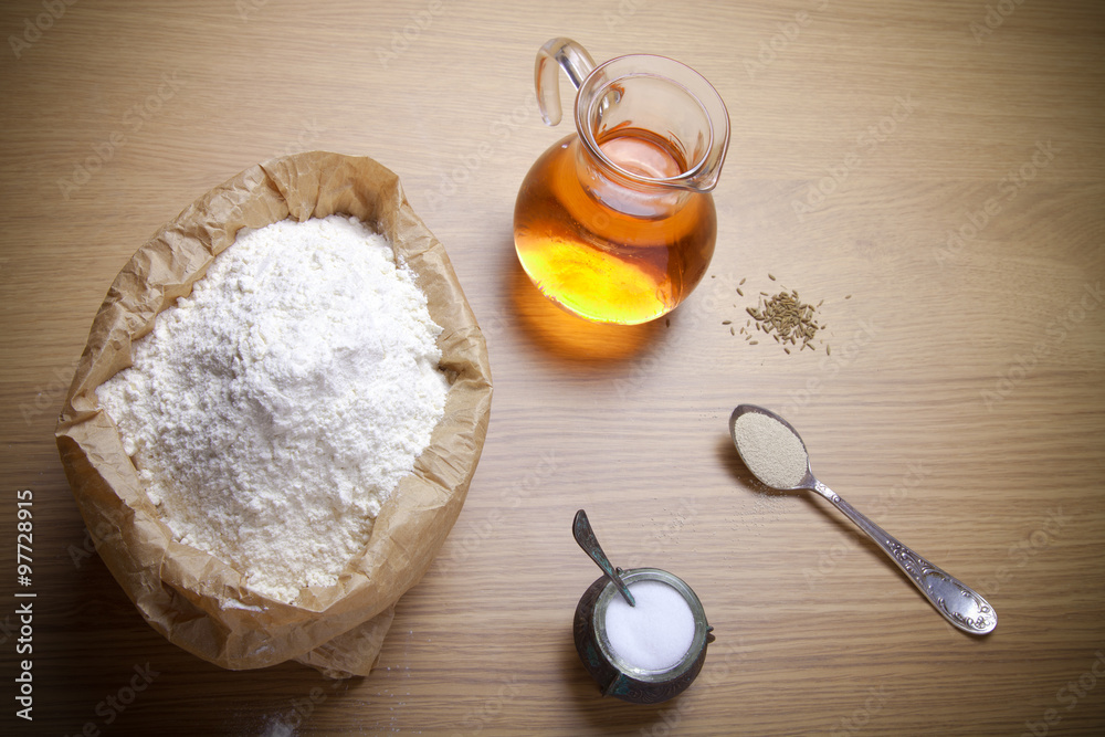 Ingredients for bread with saffron: flour, saffron water, yeast Ingredients for bread with saffron: flour, saffron water, yeast