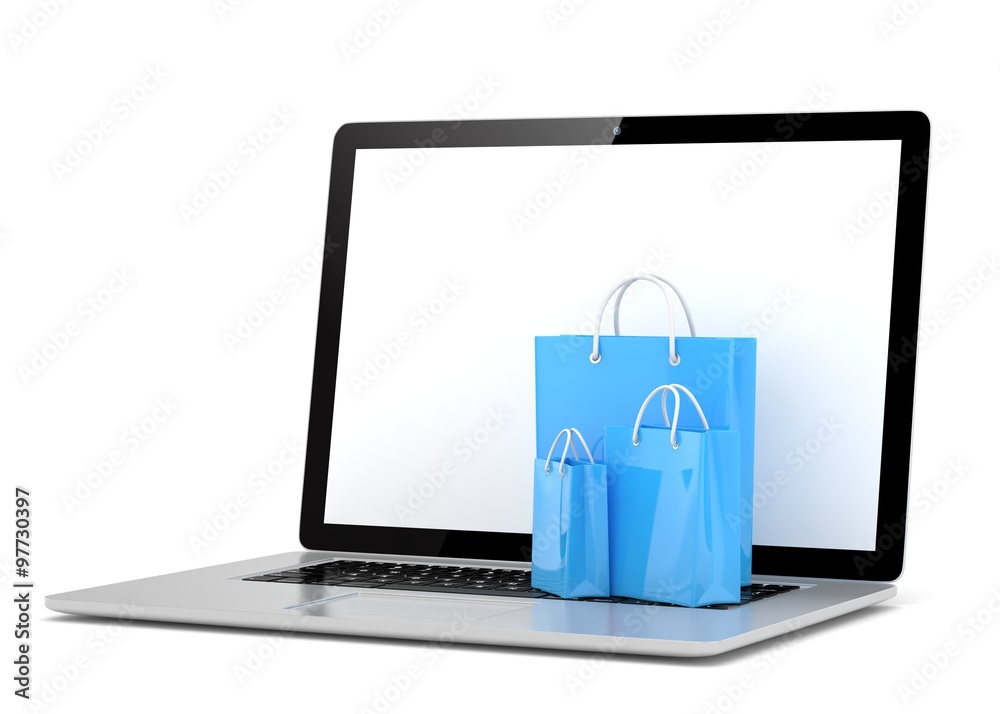 laptop and shopping pags on white background laptop and shopping pags on white background