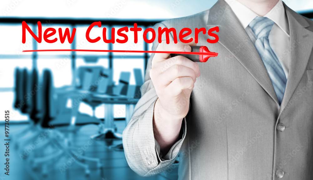 businessman writing new customers businessman writing new customers