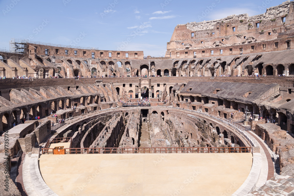 ROME - August 1: Ruins of the Colosseum and tourists in Rome on