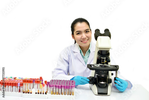 Asian female medical technologist with blood sample 