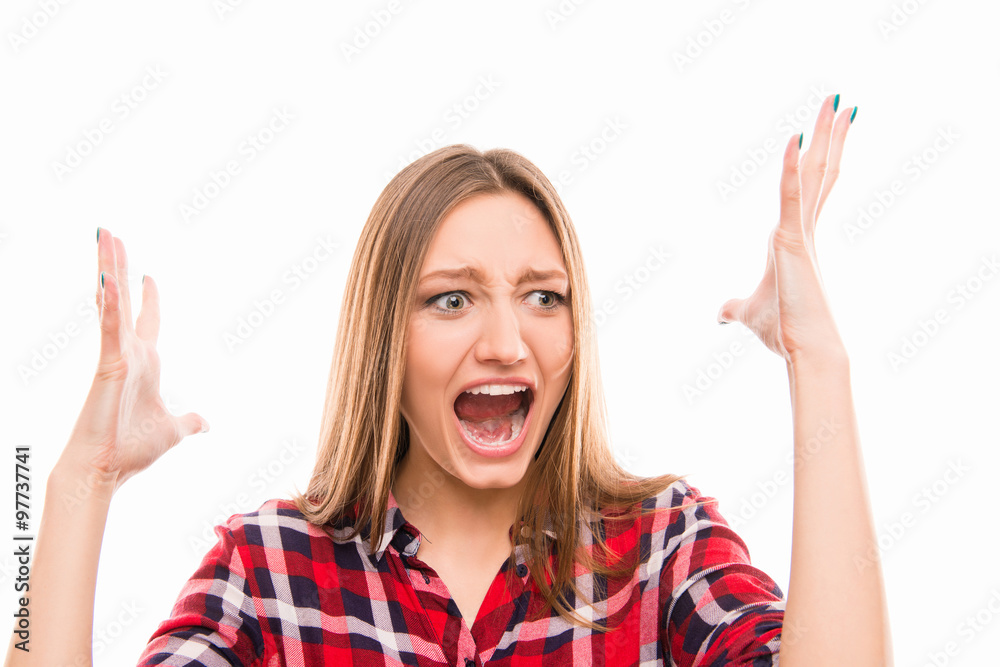 An angry girl shouting in stressed state An angry girl shouting in stressed state