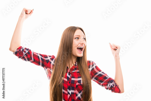 Portrait of young excited girl on white background