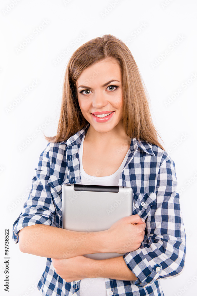 portrait of a beautiful girl with a tablet in hands portrait of a beautiful girl with a tablet in hands
