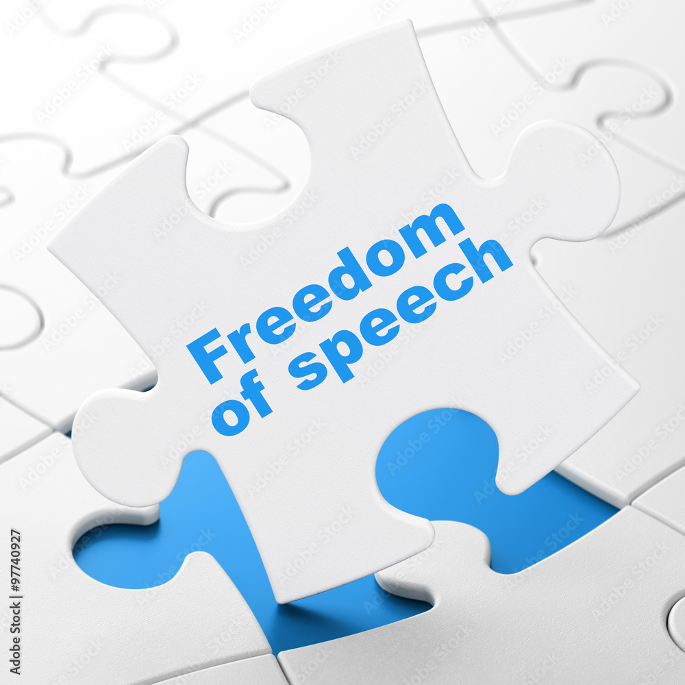 Politics concept: Freedom Of Speech on puzzle background Politics concept: Freedom Of Speech on puzzle background