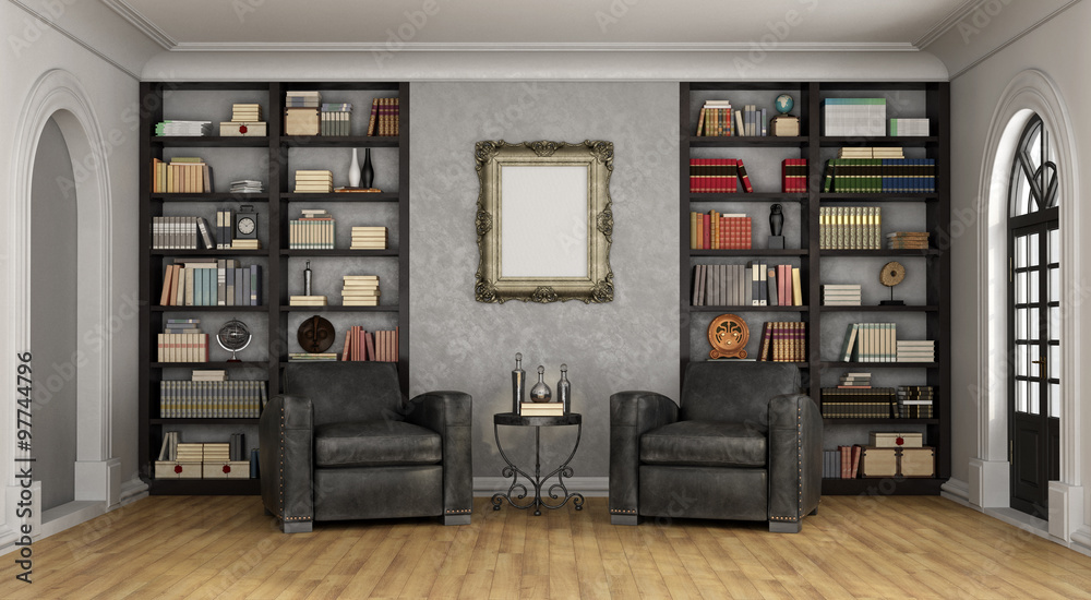Luxury living room with large bookcase and armchairs