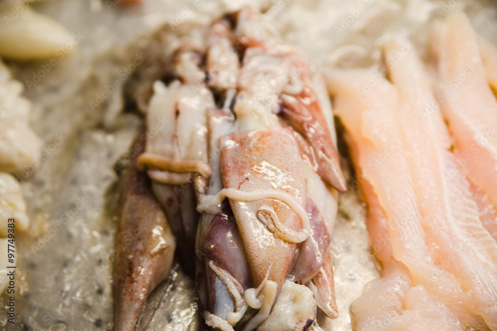 Fresh seafood in asian market, lobsters prawns and fish. Fresh seafood in asian market, lobsters prawns and fish.