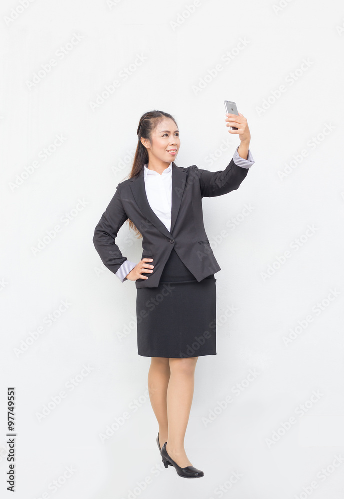 Business woman holding cellphone. checking email text messaging Business woman holding cellphone. checking email text messaging