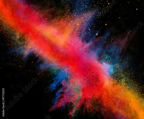 Launched colorful powder on black background