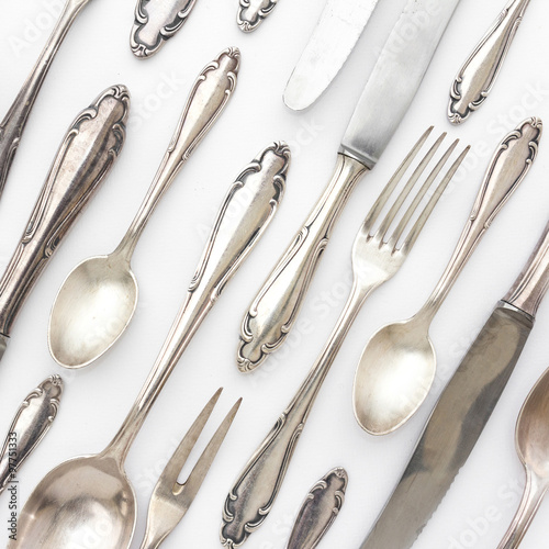 beautiful sterling cutlery collection on white background