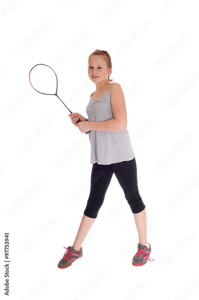 Young blond girl with her tennis racquet.