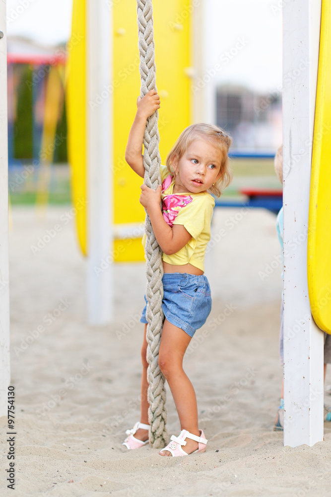 portrait of little girl outdoors in summer portrait of little girl outdoors in summer