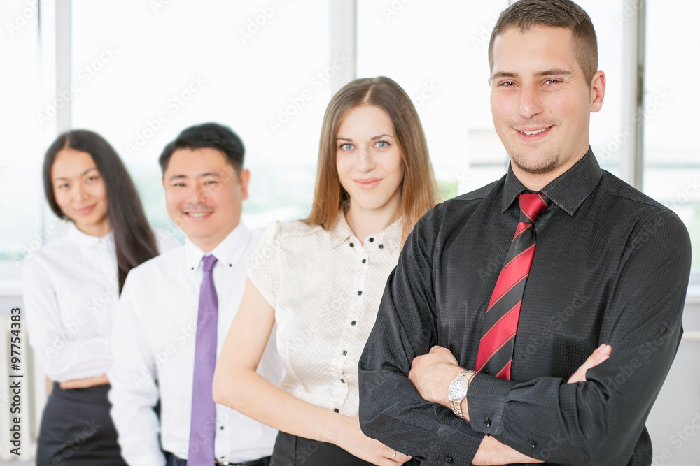 Successful young business man and business team Successful young business man and business team