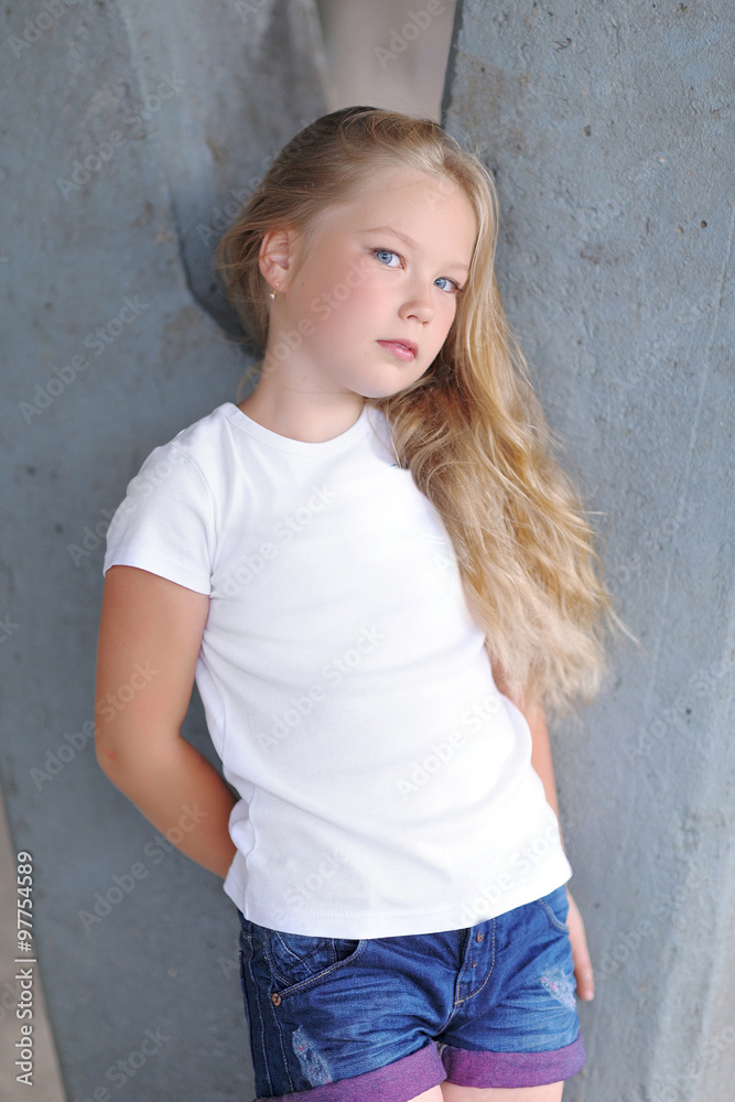 portrait of little girl outdoors in summer portrait of little girl outdoors in summer