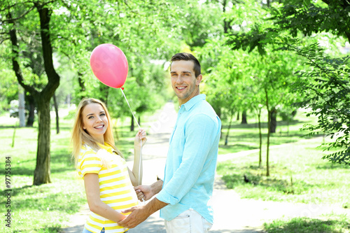 Young pregnant woman with h...