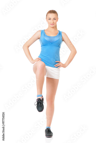 Happy woman doing fitness exercise