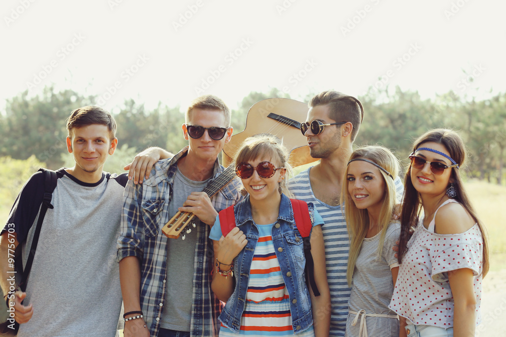 A group of joyful friends having fun outdoors