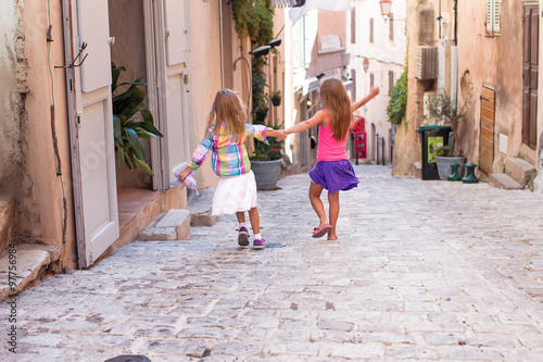 Adorable fashion little girls outdoors in European city © travnikovstudio