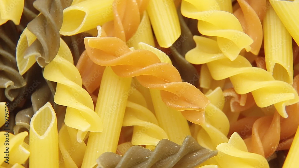 Rotated uncooked Italian macaroni pasta. Rotated uncooked Italian macaroni pasta.