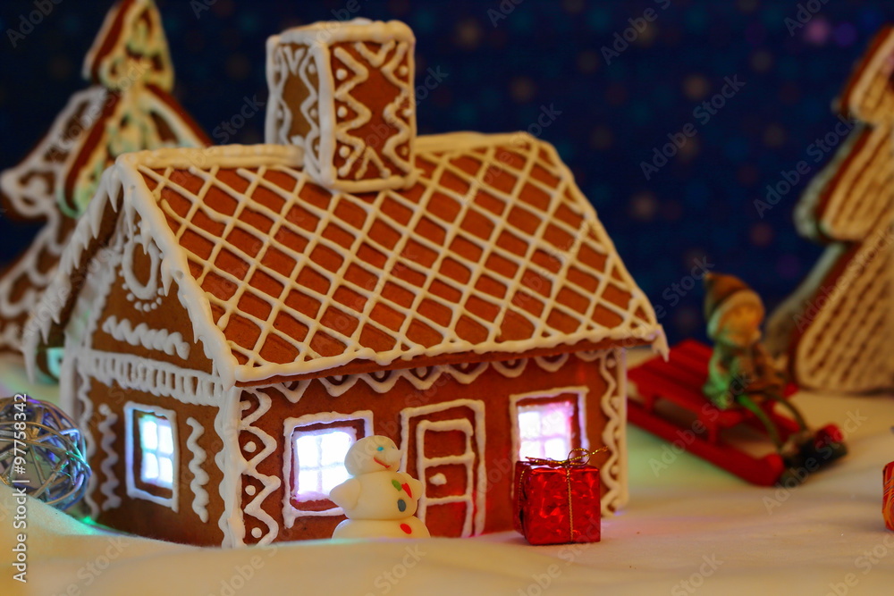 Christmas card with gingerbread house and tree