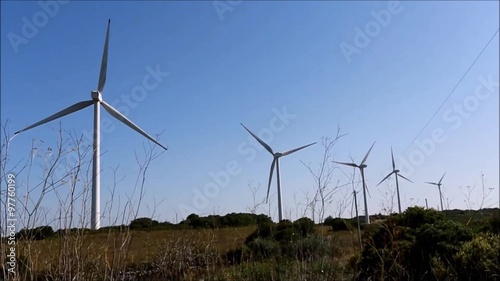 Group of operating windmills for renewable energy green project in Portugal