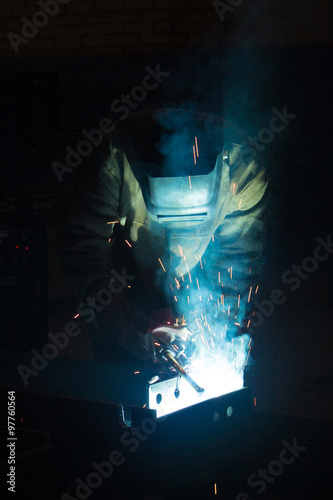 welder with blow torch © Sergei Dvornikov