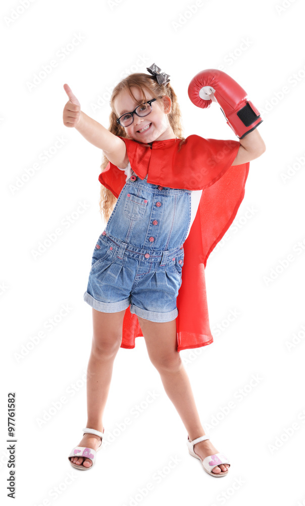 Fancy superhero girl with boxing gloves poses on white background Fancy superhero girl with boxing gloves poses on white background