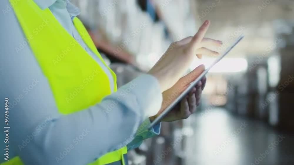 custom made wallpaper toronto digitalFemale Worker of Logistic Warehouse is using Tablet PC