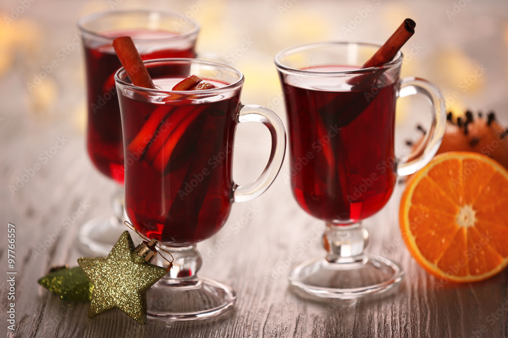 Mulled wine on wooden table Mulled wine on wooden table