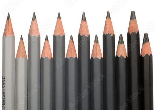 Row of black graphite pencils with different hardness