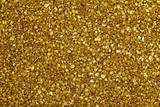 Gold nugget grains background, close-up