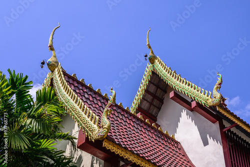 Beautiful gable apex on the roof of buddhist temple.