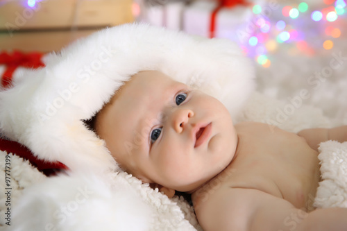 Cute naked baby in red hat ...