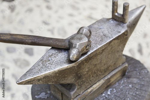 Metal anvil and hammer