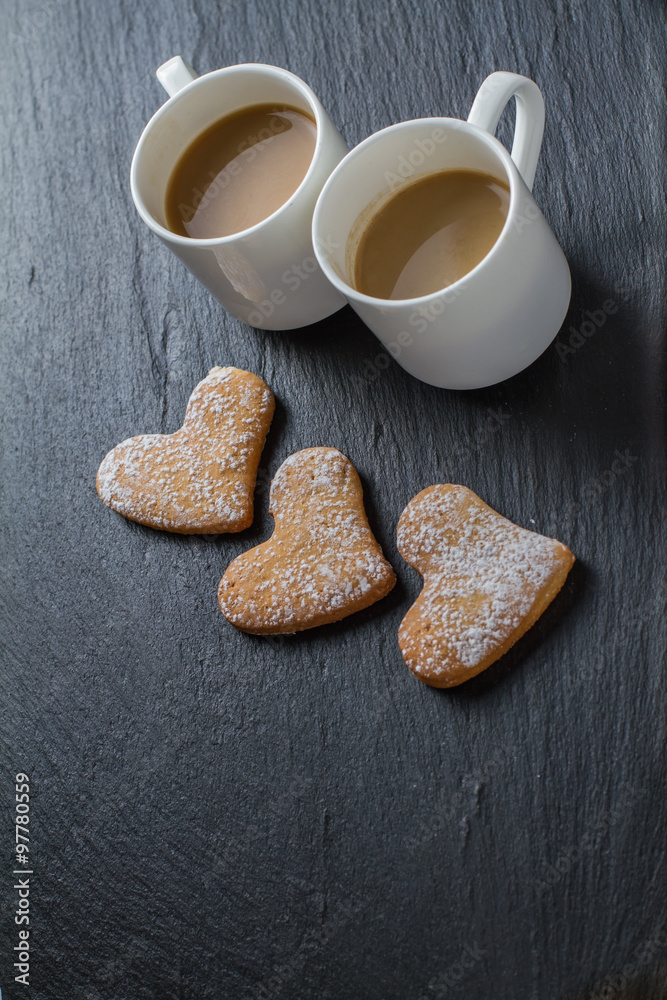 Coffee and heart shaped cookies Coffee and heart shaped cookies