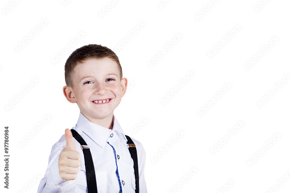 Little boy with thumb up gesture isolated over grey background.Portrait of confident happy little boy showing thumbs up gesture wearing costume isolated over white Little boy with thumb up gesture isolated over grey background.Portrait of confident happy little boy showing thumbs up gesture wearing costume isolated over white