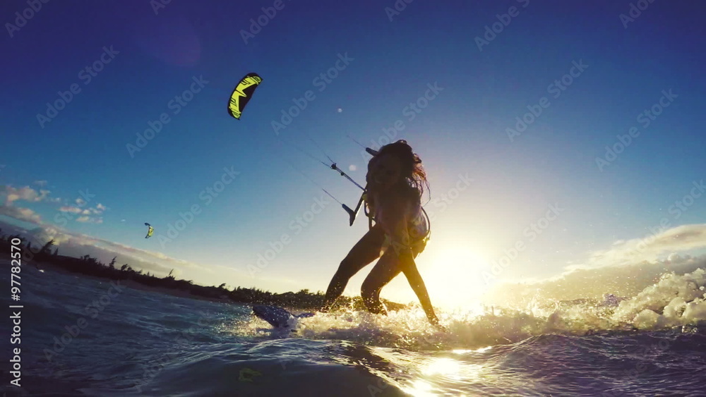 Extreme Kitesurfing at Sunset. Summer Ocean Sport in Slow Motion. Girl ...